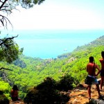 Hikers stop to enjoy the view of Kabak Bay from the Lycian Way